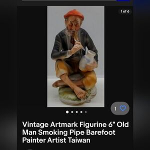Artman with a pipe